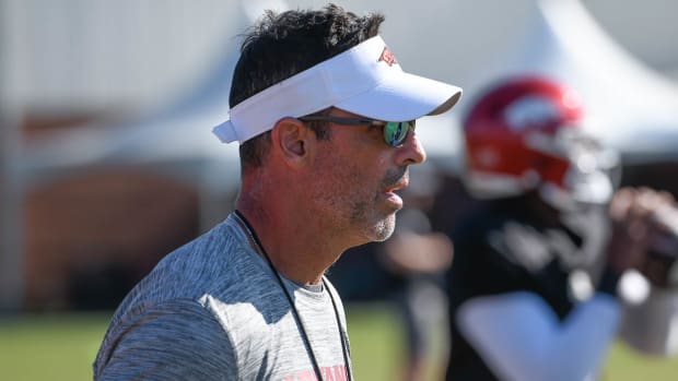 Razorbacks offensive coordinator Dan Enos at outdoor practice field